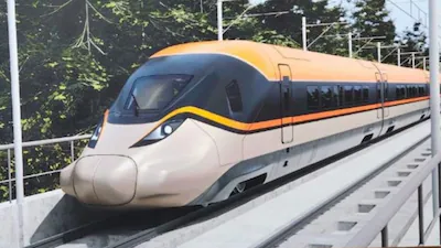 You are currently viewing India’s First Bullet Train: भगवा-सफेद रंग में दिखी भारत की पहली बुलेट ट्रेन, ‘रफ्तार की रानी’ की तस्वीर ने इंटरनेट पर मचाया तहलका