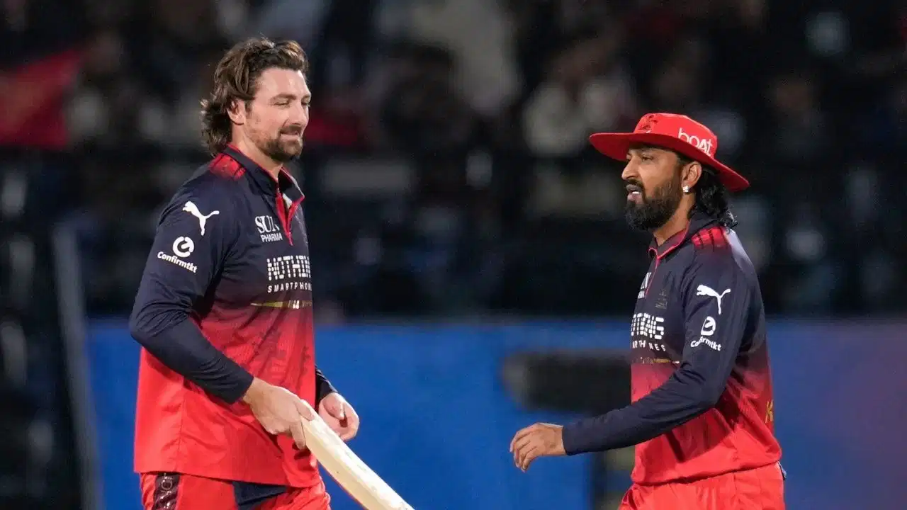 You are currently viewing IPL 2026: चैंपियन बनते ही RCB को लगा बड़ा झटका, फाइनल के ‘विलेन’ बने टिम डेविड पर लगा एक मैच का बैन
